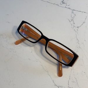 PRADA glasses.